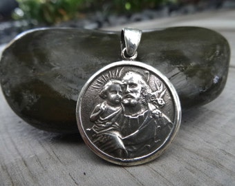 Sterling silver Medallion. Saint Joseph and Jesus Child.