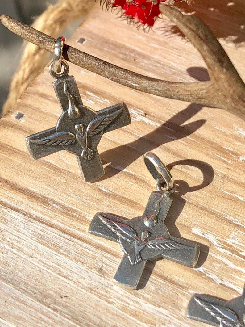 Holy Spirit Cross Sterling Silver.
