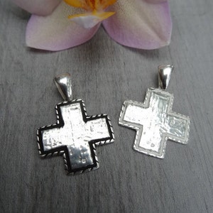 Sterling silver cross pendant. Equilibrium cross.