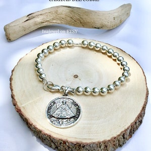 Nuestra Señora de la Caridad del Cobre. Pulsera de Cuentas en Plata de Ley.