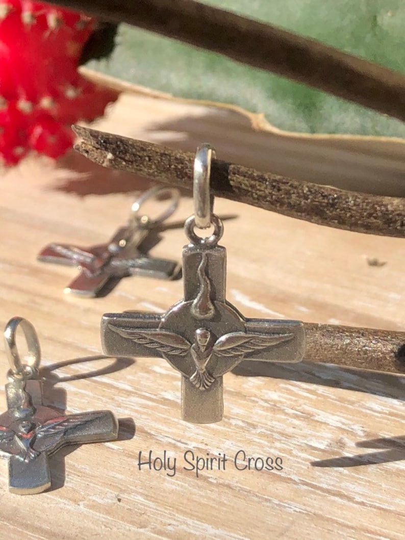Holy Spirit Cross Sterling Silver.
