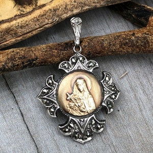 Sister Therese of Child Jesus / Lisieux. Religious vintage 18K and silver.