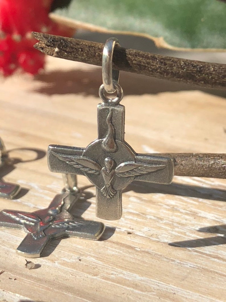 Holy Spirit Cross Sterling Silver.