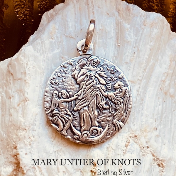 Mary Undoer of knots. Sterling Silver Charm.