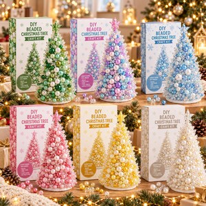 May include: Six DIY beaded Christmas tree craft kits in green, purple, blue, pink, yellow, and white. Each kit includes a box with a matching tree illustration and a finished beaded tree topped with a star, featuring various pearl and bead sizes.