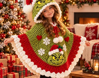 May include: A green crochet poncho featuring a hood with a Grinch face and a red Santa hat. The poncho is decorated with white snowflakes, red hearts, and a large Grinch face appliqué at the bottom, finished with a white pom-pom trim.
