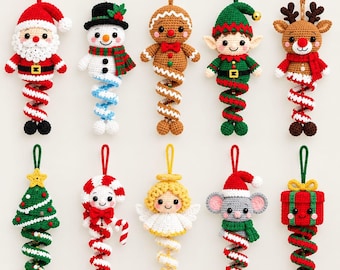 May include: A collection of ten crocheted Christmas ornaments featuring characters including Santa Claus, a snowman, a gingerbread person, an elf, a reindeer, a Christmas tree, a candy cane, an angel, a mouse, and a gift box, all with spiral tails.