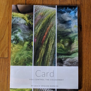 May include: Book cover with the title "Card: You Control the Colourway" by Grace Shalom Hopkins. The cover features three images of colorful yarn.