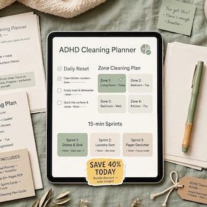 May include: A digital tablet displaying an ADHD Cleaning Planner with sections for Daily Reset, Zone Cleaning Plan, and 15-min Sprints. The screen shows text, checkboxes, and color-coded boxes. Printed planner pages, a pen, and notes are arranged around the tablet.