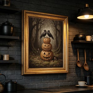 May include: A framed wall art piece featuring a vertical stack of three carved jack-o'-lanterns topped by two black crows in a dark, misty forest setting. The artwork is enclosed in a decorative gold frame and displayed on a dark brick wall.
