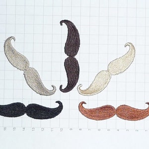 May include: Five embroidered iron-on patches in the shape of moustaches. The moustaches are in different colours: black, brown, beige, and two shades of brown.