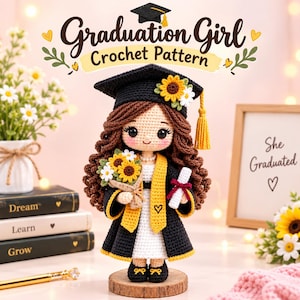 May include: A crochet doll wearing a black graduation cap with a yellow tassel and sunflower, a black gown with yellow trim, and a white dress. The doll has brown hair, holds a bouquet of sunflowers and a white diploma, and stands on a wooden base.