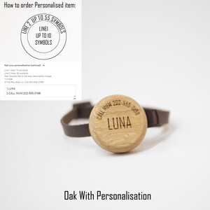 K&ouml;nnte beinhalten: Ein personalisiertes Haustier-Tag aus Eichenholz mit dem Namen "LUNA" und einer Telefonnummer, die auf der Holzoberfl&auml;che eingraviert sind. Das Tag ist an einem braunen Lederriemen befestigt. Der Text "Oak With Personalisation" steht unten.