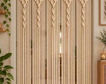 May include: A cream-colored macrame door curtain featuring five vertical panels suspended from a wooden rod. Each panel displays a complex knotted pattern at the top, transitioning into long, straight, hanging fringe cords.