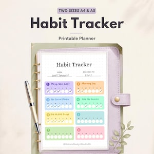 May include: A printable habit tracker planner page in A4 and A5 sizes, featuring a dot grid layout with eight colourful numbered boxes for daily tasks, checkboxes for days of the week, and text fields for week and name, displayed in a light purple binder.
