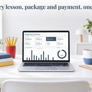 Tutoring bookkeeping spreadsheet annual dashboard open on a laptop on a desk