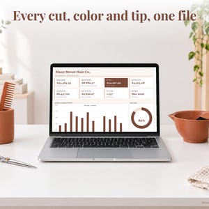Hair Stylist bookkeeping spreadsheet annual dashboard open on a laptop on a desk
