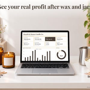 Candle Business bookkeeping spreadsheet annual dashboard open on a laptop on a desk