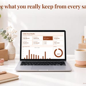 Etsy Seller bookkeeping spreadsheet annual dashboard open on a laptop on a desk