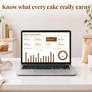 Bakery Business bookkeeping spreadsheet annual dashboard open on a laptop on a desk
