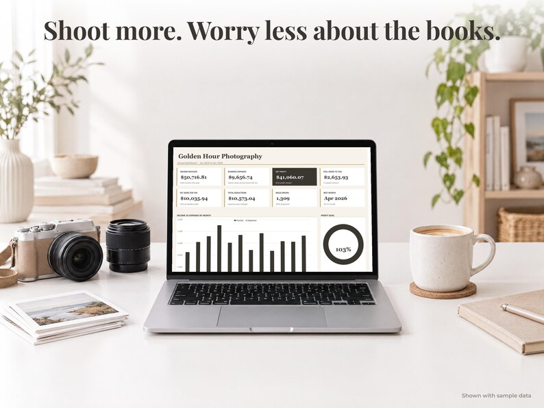 Photographer bookkeeping spreadsheet annual dashboard open on a laptop on a desk
