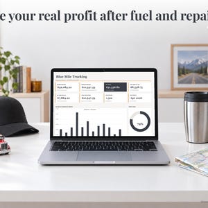 Truck Driver bookkeeping spreadsheet annual dashboard open on a laptop on a desk