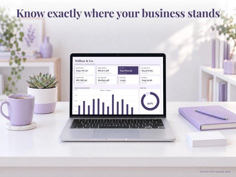 Small Business bookkeeping spreadsheet annual dashboard open on a laptop on a desk