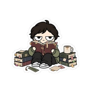 May include: A cartoon sticker featuring a person with dark hair and a bored expression reading a brown book. The person wears a green sweater and black pants, surrounded by stacks of books with colorful page markers, a coffee mug, and a bookmark.