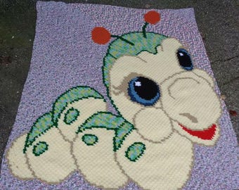 Inch Worm mini c2c with written row by row color and block count instructions.