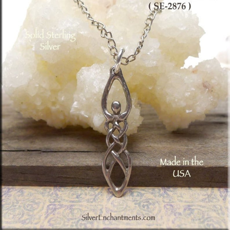 May include: A silver pendant necklace featuring a Celtic knot design in the shape of a woman. The pendant is made of solid sterling silver and is made in the USA. (SE-2876)
