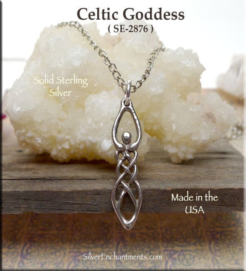 May include: A silver Celtic goddess pendant necklace with a knotted design. The necklace is made in the USA and is made of solid sterling silver. The pendant is hanging from a silver chain.