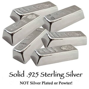 May include: Five silver bars, each with a raised design and the inscription "Solid .925 Sterling Silver NOT Silver Plated or Pewter!"