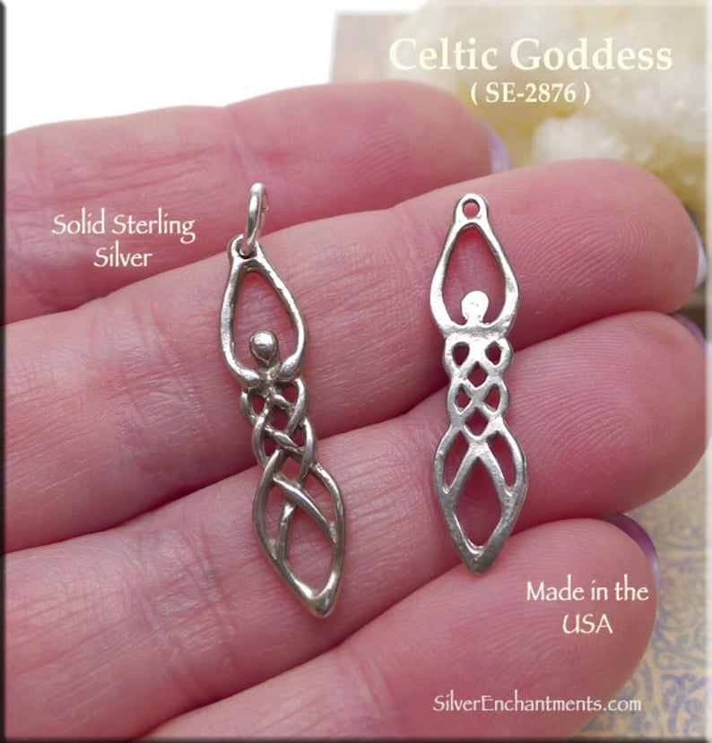 May include: A silver Celtic Goddess pendant charm with intricate knotwork design. The pendant is made of solid sterling silver and is made in the USA. The pendant is shown on a hand.