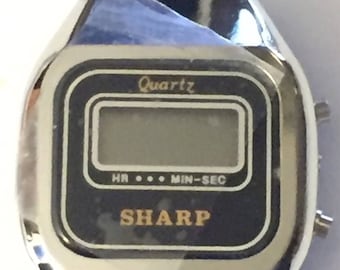 sharp digital watch