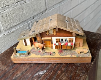 Vtg Schwarzwälder Deutsches Bauernhaus mit Kuh Miniatur Spieluhr NICHT FUNKTIONIERT Reuge Schweizer Musikbewegung bis zum Ende der Zeit 1960er Jahre Schmid Bros