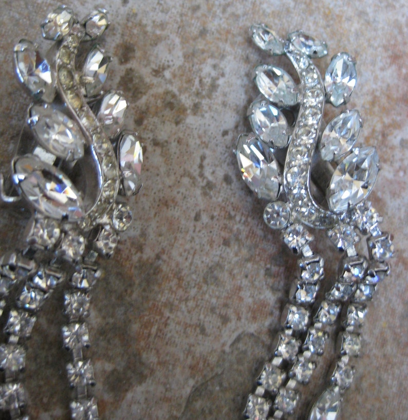 AVON of Belleville Shoulder Dusters Runway Climber Earrings Designer Vintage Hand Set Rhinestone Rhodium Clip Ons Black Tie Affair SALE
