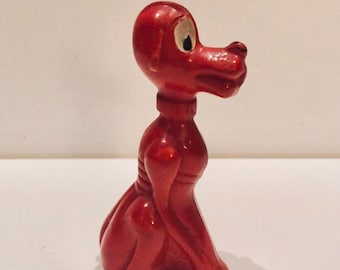 Chocalho vintage de meados do século XX, figura 3D de cachorro bobo de plástico vermelho, da Milro Company, E Patterson, NJ.