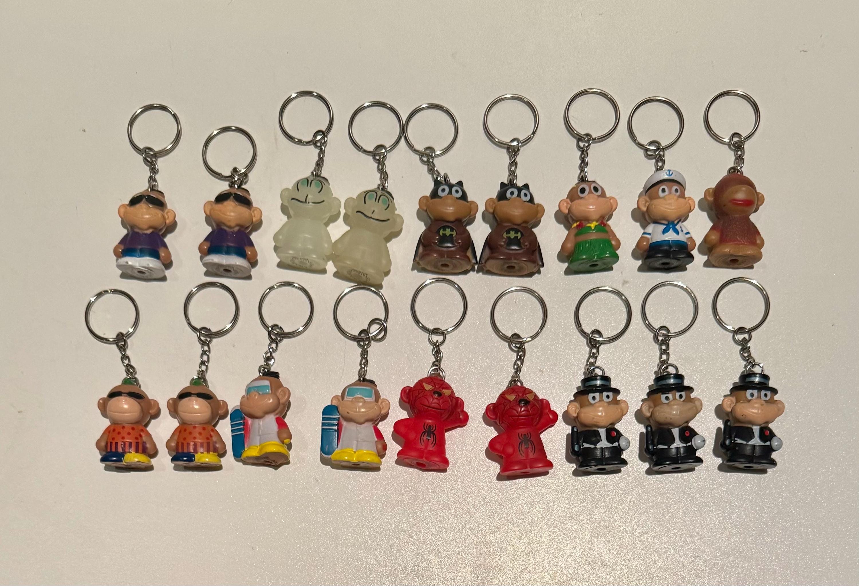 Vintage Lot of 18 Rubber Cartoon Character Star Awards Keychains
