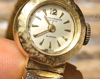 14K Gold Diamant Baume & Mercier Vintage Damen Armbanduhr Circa 1960er-70er Jahre Retro Florentiner Finish Gold Armband Band 17J 28 G
