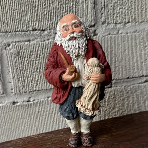 1990 Vintage June McKenna Santa Claus Christmas Ornament Figurine Old World Kris Kringle St Nick Holding Doll Stocking Stuffer Collectibles