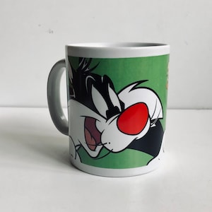 Taza de Silvestre y Piolín de Looney Tunes de 1998, Dibujos animados de Warner Bros, Gato y Ratón, Gibson Stoneware, 1998, EUC