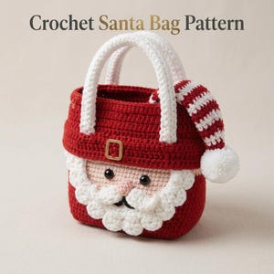 May include: A red and white crochet bag featuring a Santa Claus face design with a beard, black eyes, and a belt buckle. The bag has two white handles and a dangling red and white striped hat with a white pom-pom. Text reads Crochet Santa Bag Pattern.