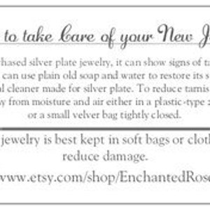 May include: A white card with the text "How to take care of your New Jewelry". The card provides instructions on cleaning and storing silver-plated jewelry. The Etsy shop URL is at the bottom.