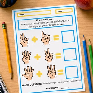 May include: A white educational worksheet titled Finger Addition with blue borders. It features three math problems using illustrations of hands showing different finger counts, plus signs, equals signs, empty boxes for answers, and a bonus question.