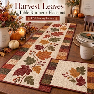 Puede incluir: Un patrón de costura PDF para camino de mesa y mantel individual Harvest Leaves, con tela color crema, un motivo central de hojas de arce y bayas acolchadas en rojo, naranja y verde, bordeado por un patchwork de cuadrados en tonos otoñales.