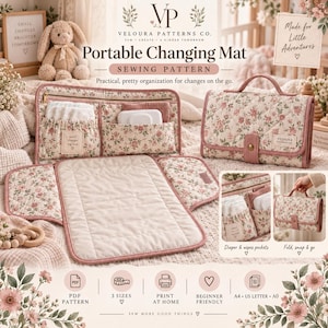 May include: A portable changing mat sewing pattern by Veloura Patterns Co. featuring a quilted floral fabric design. The mat includes interior pockets for diapers and wipes, a top handle, and a snap closure. The pattern is available in 3 sizes.
