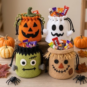 May include: Four crocheted drawstring bags featuring Halloween characters: an orange pumpkin, a white ghost, a green monster, and a tan scarecrow. Each bag is filled with assorted candy bars and is surrounded by small pumpkins and plastic spiders.