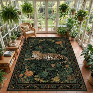 May include: A rectangular area rug featuring a central leopard lying down amidst a dense botanical pattern of dark green leaves and orange flowers, enclosed by a decorative border with intricate gold and black scrollwork details.