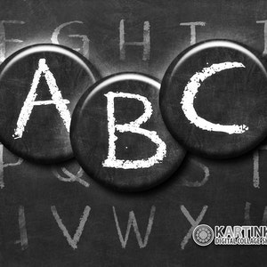 May include: Black and white image of three circular objects with the letters "A", "B", and "C" in white, set against a chalkboard background. The letters are in a bold, handwritten style. The background features faint chalk-written letters.