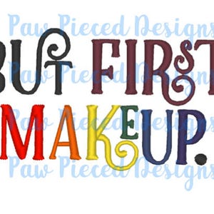 May include: Embroidered design with the text "But first, makeup." in rainbow colors. The text "But" is black, "first" is maroon, and "makeup" is in rainbow colors.